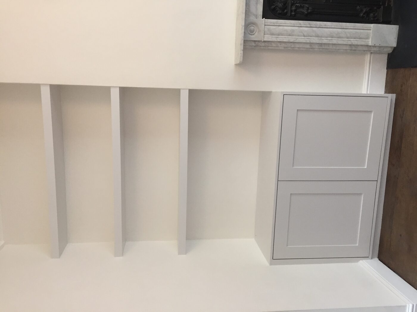 Alcove cupboard with shelves above