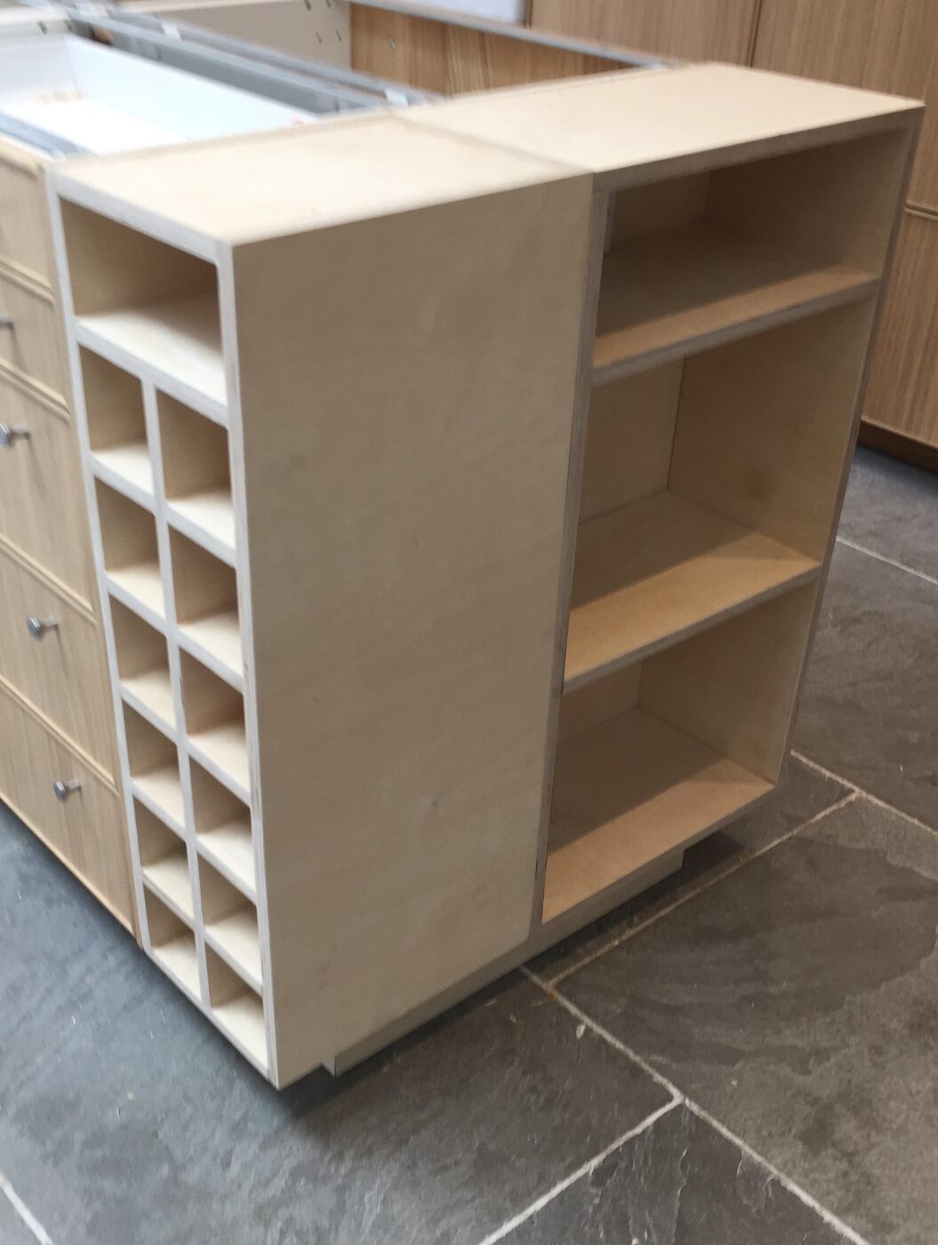 Kitchen island end unit with wine rack and shelves