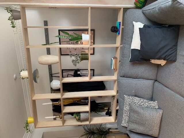 Finished plywood room-divider shelving